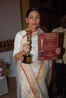 Deepti Naval poses with her award at Golden Achiever Awards