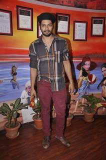 Ali Fazal poses for the media at the Promotions of Khamoshiyan on Red FM