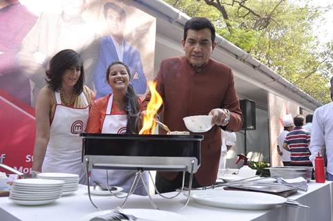 Sanjeev Kapoor prepares a dish at the Launch of Master Chef Season 4