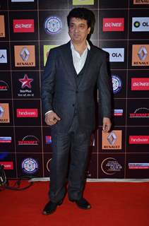 Sajid Nadiadwala poses for the media at Star Guild Awards