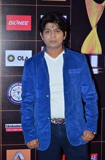 Ankit Tiwari poses for the media at Star Guild Awards