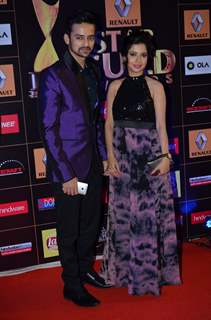 Varunn Jain and Pooja Singh pose for the media at Star Guild Awards