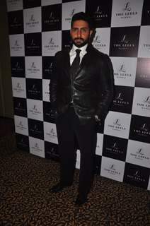 Abhishek Bachchan poses for the media at the Press Conference of the 60th Filmfare Awards 2014