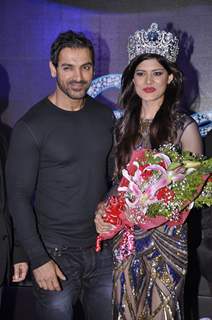 John Abraham poses with the winner at the Launch of Yamaha Fascino Calendar