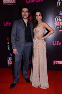 Arbaaz Khan and Malaika Arora Khan pose for media at 21st Annual Life OK Screen Awards Red Carpet