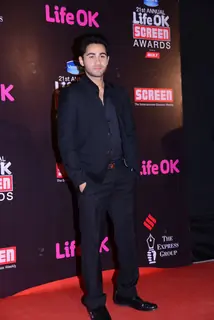 Armaan Jain poses for the media at 21st Annual Life OK Screen Awards Red Carpet