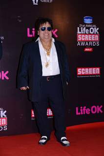 Bappi Lahiri poses for the media at 21st Annual Life OK Screen Awards Red Carpet