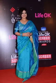 Divya Dutta poses for the media at 21st Annual Life OK Screen Awards Red Carpet