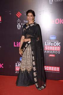 Deepika Padukone poses for the media at 21st Annual Life OK Screen Awards Red Carpet