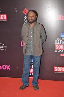 Ketan Mehta poses for the media at 21st Annual Life OK Screen Awards Red Carpet