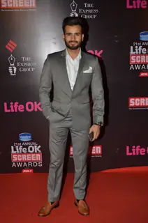 Karan Tacker poses for the media at 21st Annual Life OK Screen Awards Red Carpet