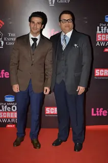 Girish Kumar and Ramesh Taurani pose for the media at 21st Annual Life OK Screen Awards Red Carpet