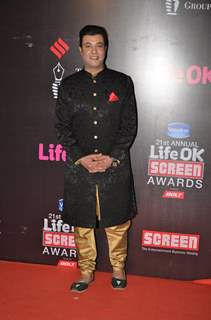Varun Sharma poses for the media at 21st Annual Life OK Screen Awards Red Carpet