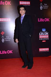 Jeetendra poses for the media at 21st Annual Life OK Screen Awards Red Carpet