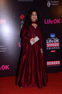 Juhi Chawla poses for the media at 21st Annual Life OK Screen Awards Red Carpet