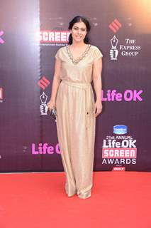 Kajol Devgn poses for the media at 21st Annual Life OK Screen Awards Red Carpet