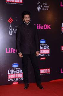 Riteish Deshmukh poses for the media at 21st Annual Life OK Screen Awards Red Carpet