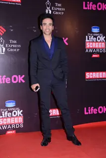 Tusshar Kapoor poses for the media at 21st Annual Life OK Screen Awards Red Carpet