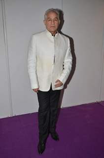 Dalip Tahil poses for the media at ITT Travel Exhibition