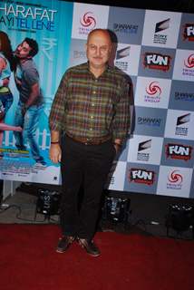 Anupam Kher poses for the media at the Premier of Sharafat Gayi Tel Lene