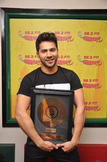 Varun Dhawan poses for the media at the Promotions of Badlapur on Radio Mirchi