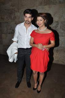 Gurmeet Choudhary and Debina Choudhary pose for the media at the Special screening of Khamoshiyan