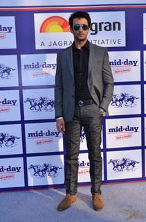 Nandish Sandhu poses  for the media at Mid Day Race