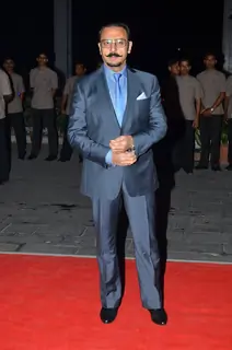 Gulshan Grover poses for the media at Kush Sinha's Wedding Reception
