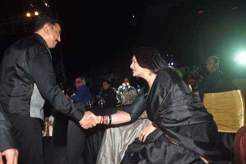 Kamal Haasan was snapped greeting Sarika at the Music Launch of Shamitabh