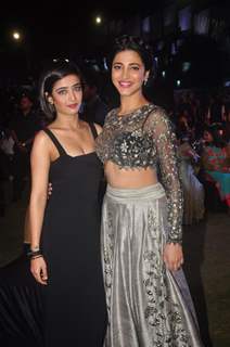 Akshara Haasan and Shruti Haasan pose for the media at the Music Launch of Shamitabh