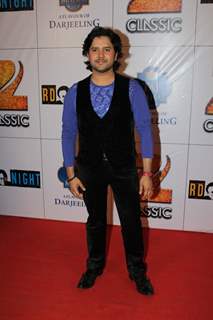 Javed Ali poses for the media at the Celebration of 75 years of Musical Genius - R.D. Burman