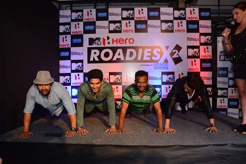 Celebs were snapped doing push ups at the Press Conference of MTV Roadies X2