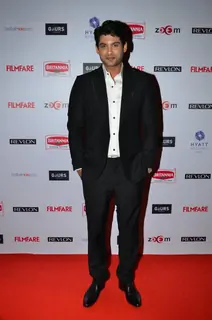 Siddharth Shukla poses for the media at Filmfare Nominations Bash