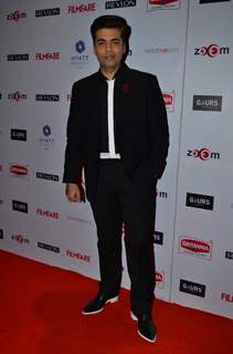 Karan Johar poses for the media at Filmfare Nominations Bash