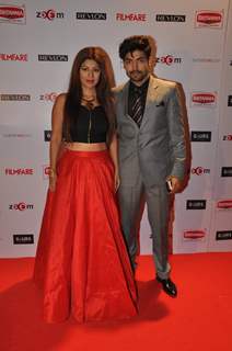 Gurmeet Choudhary and Debina Bonnerjee Choudhary pose for the media at Filmfare Nominations Bash