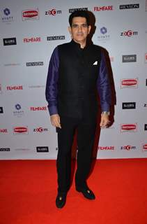 Omung Kumar poses for the media at Filmfare Nominations Bash