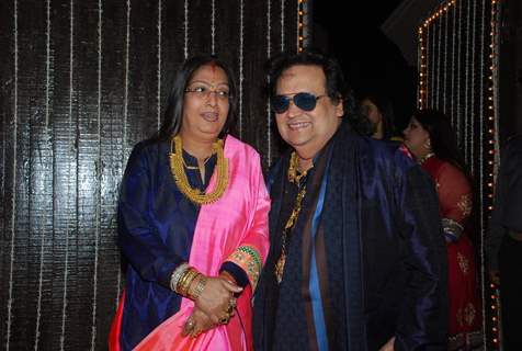 Bappi Lahiri poses with wife at their Wedding Anniversary