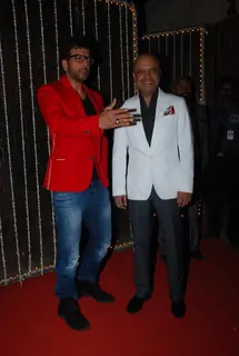 Javed Jaffrey and Naved Jaffrey pose for the media at Bappi Lahiri's Wedding Anniversary