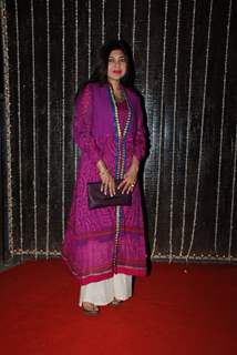 Alka Yagnik poses for the media at Bappi Lahiri's Wedding Anniversary