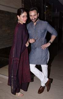 Saif Ali Khan and Kareena Kapoor pose for the media at Soha Ali Khan's Mehendi Ceremony