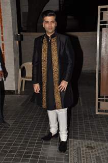 Karan Johar poses for the media at Soha Ali Khan and Kunal Khemu's Wedding Reception