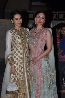 Karisma Kapoor and Kareena Kapoor pose at Soha Ali Khan and Kunal Khemu's Wedding Reception