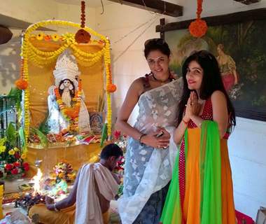 Kavita Kaushik and Sumona Chakravarti pose for the media at Bappi Lahiri's Saraswati Pooja