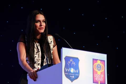 Neha Dhupia addressing the audience at Discon District Conference