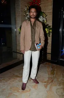 Irrfan Khan poses for the media at Irshad Kamil's Book Launch
