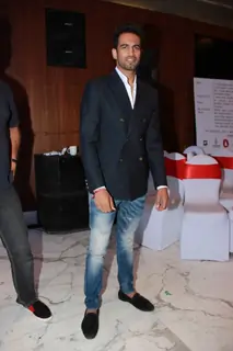 Upen Patel poses for the media at Arya Babbar's Book Launch