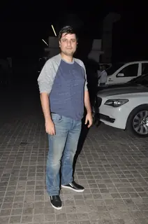 Goldie Behl poses for the media at the Special Screening of Shamitabh