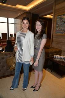 Simone Singh poses with a friend at Lancome Promotional Event