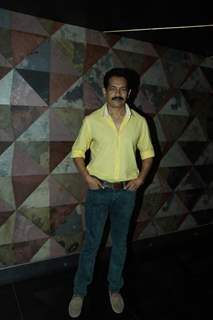 Atul Kulkarni poses for the media at the Premier of Marathi Movie Baji