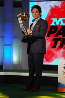 Sachin Tendulkar poses with the trophy at MRF Promotions